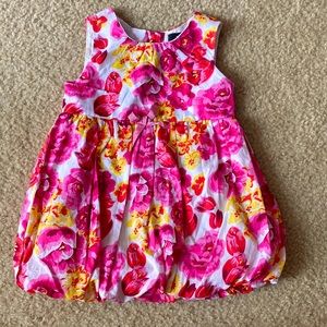18m floral dress, elastic in the bottom. Button detail in the back. Worn once